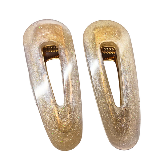Golden Glow Hair Clips set of 2 by ItFits.ae, stylish hair accessories with shiny gold finish and secure clasp design.