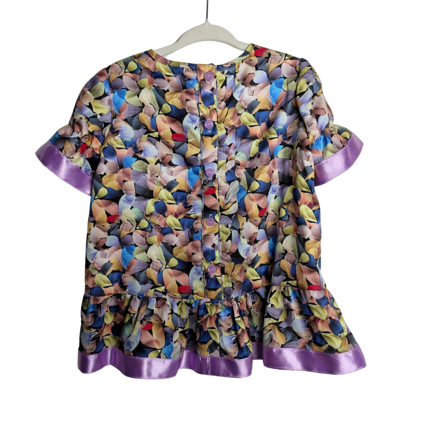Tutti Frutti satin-trim tunic dress in vibrant colors, featuring a relaxed fit and elegant satin accents, displayed on a mannequin.