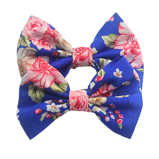 Set of two Blossom Hair Bows featuring pink and floral designs, perfect for children's hairstyles and accessories.