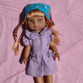 Lilly doll in lilac dress